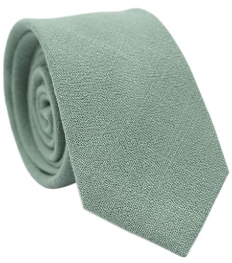 PRICES MAY VARY. Slim solid necktie measures 2.5 inch at the widest point and 58 inch length These dusty sage ties are in trends of popular colors, especially for wedding palettes, such as for matching dress color from David's bridal and Azazie Hand made by skilled workers, cotton and linen blend fabric with fully lined, proper thickness would make a sturdy and nice knot Middle-skinny ties, neither too wide nor too narrow, perfect for weddings, churches, parties, school activities, etc. If you n Wedding Palettes, Sage Green Tie, Dusty Sage, Green Tie, Wedding Ties, Popular Colors, Fine Linen, Davids Bridal, Green Man