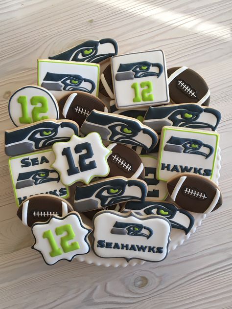 Seattle Seahawks cookies by Dyan Seahawks Themed Birthday Party, Seattle Seahawks Birthday Party Ideas, Seahawks Birthday Party, Seahawk Cake, Seattle Seahawks Cake, Seahawks Food, Seahawks Cake, Seahawks Party, Sports Cookies