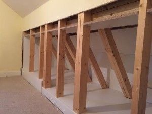 woodwork exposed under eaves Eaves Storage Ideas, Storage Sliding Doors, Under Eaves Storage, Attic Storage Solutions, Loft Conversion Bedroom, Bespoke Wardrobes, Cabin Beds, Eaves Storage, Attic Conversion