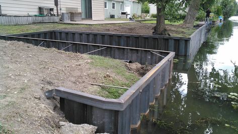 Steel - Seawalls Unlimited Seawall Ideas Lake Retaining Walls, Seawall Ideas, Slope Backyard, Dock Pilings, Gabion Walls, Diy Retaining Wall, Swimming Ponds, Riverside Garden, Land Development