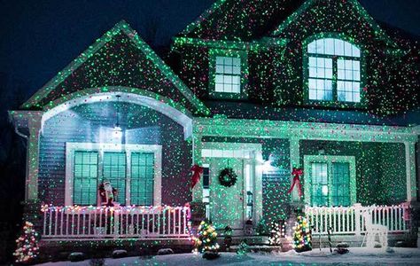 Laser projected Christmas lights are easier than stringing strands of lights / Boing Boing Outdoor Christmas Light Projector, Christmas Projection Lights, Hanging Tree Lights, Laser Christmas Lights, Christmas Light Projector, Laser Christmas, Xmas Decorations Outdoor, Laser Lights Projector, Tangled Lights