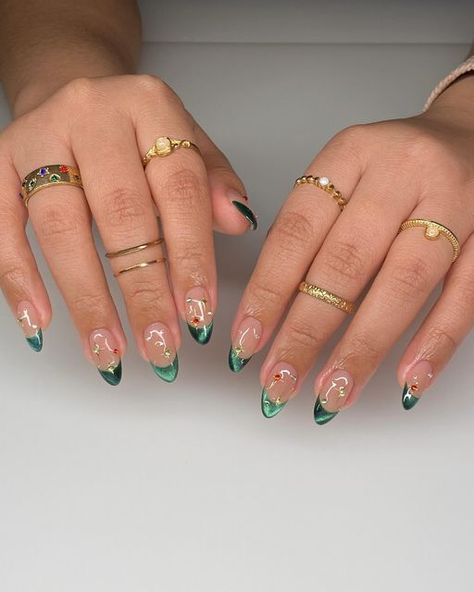 Nail Extensions Las Piñas on Instagram: "emerald green cat eye frenchiess ✨🎄" Green Cat Eye Nails French Tip, Emerald Tip Nails, Pink And Green Cat Eye Nails, Half Cat Eye Nails, Forest Green Cat Eye Nails, Emerald Short Nails, Green Cat Eye French Tip Nails, Emerald Cat Eye Nails, Green Almond Nails French Tip