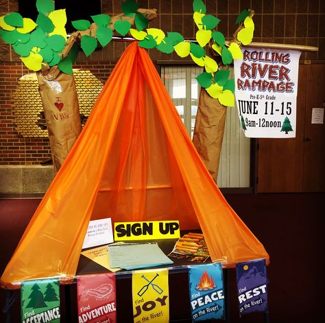 Rolling River Rampage VBS sign up table at Augusta United Methodist Church. River Rafting Adventure Vbs, Vbs Sign Up Table, Camp Theme Vbs Decorations, Campfire Vbs Decor, Campfire Light Vbs, River Decorating Ideas, Camping Vacation Bible School, Cokesbury Camp Firelight Vbs, Camp Vbs Decorations