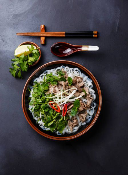 World's Best Vietnamese Food Stock Pictures, Photos, and Images - Getty Images Healthy Small Bites, Background Magazine, Pho Photography, Pho Soup Recipe, Soup With Beef, Vietnamese Soup, Food Photography Composition, Vietnamese Pho, Pho Soup