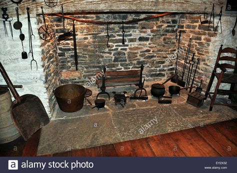 Download this stock image: Guilford, Connecticut: Large hearth fireplace with 17th century cooking utensils at the historic 1639 Henry Whitfield House - EY2X32 from Alamy's library of millions of high resolution stock photos, illustrations and vectors. Primitive Fireplace, Cooking Hearth, Guilford Connecticut, Hearth Fireplace, Fireplace Cooking, Wood Burning Cook Stove, Vintage Door Hardware, Historic Kitchen, Colonial Interior