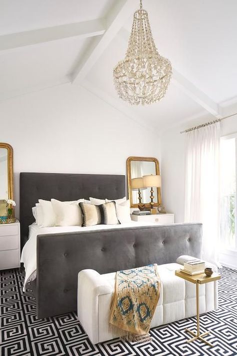 a creamy and grey bedroom is glammed up with brass touches White Gold Bedroom, Grey And Gold Bedroom, Gold Bedroom Decor, Drop Chandelier, Glam Bedroom, Tufted Bed, Gold Bedroom, Grey Bedroom, Perfect Bedroom