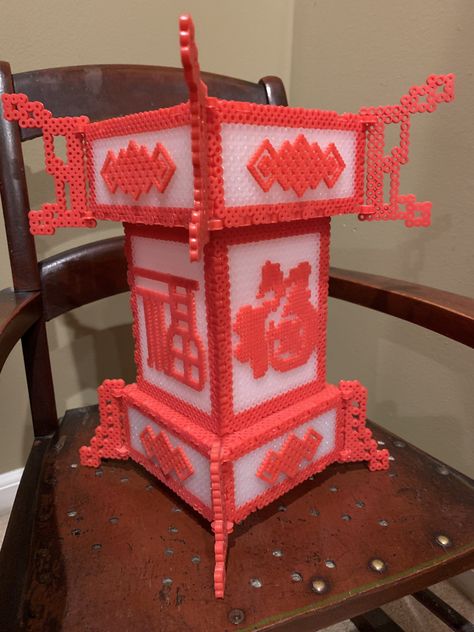 Perler beads Chinese style lantern. Used clear beads so it lights up with an electrical candle inside. Beaded Candle Holders, Beads Projects, Beaded Candle, 3d Perler Bead, Diy Perler Bead Crafts, Perler Crafts, Beads Designs, Beads Ideas, Motifs Perler