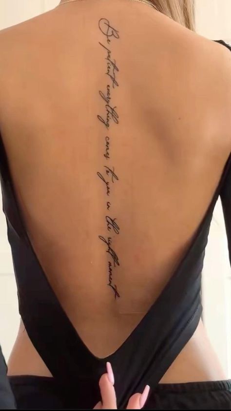 Spine Tattoos Text, Text Back Tattoo Women, Long Spine Tattoo Quotes, Spine Tattoo Words And Flower, Written Back Tattoos, Fine Line Full Back Tattoo, Side Body Tattoos For Women Ribs Words, Spine Tattoos For Women Strength, Spine Tattoo And Tramp Stamp