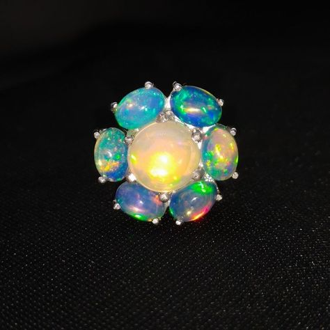 Enhance your jewellery collection with these stunning rings! From vintage fire opal to elegant black onyx and vibrant blue topaz. Perfect for any occasion. #VintageJewellery #Handmade #Gemstones ✨ Stunning Rings, Sterling Silver Opal Ring, Jewelry Manufacturing, Jelly Opal, Silver Opal Ring, Jewelry Designing, Fire Flower, Fire Opal Ring, Everyday Rings