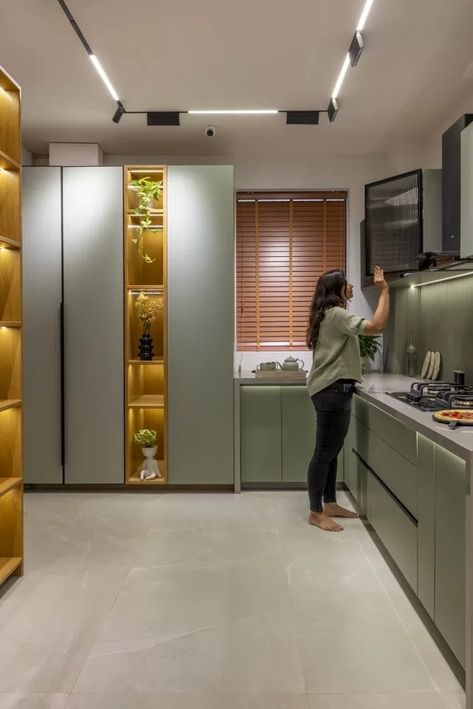 Kitchen Showcase Design with a Twist of Wardrobe Display | J Architects - The Architects Diary Kitchen Showcase, Hardware Display, 2024 Living Room, Living Room Designs India, Wardrobe Display, Kitchen Cabinetry Design, Kitchen Designer, Modern Kitchen Cabinet Design, Kitchen Wardrobe