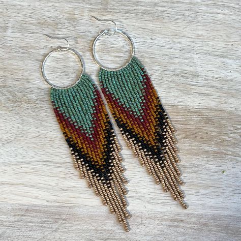 Ultra lightweight beaded fringe earrings, (made with tiny, size 15 seed beads) in turquoise, red, and yellow tones, suspended from sterling silver hoops. Details~ * Made with glass seed beads and sterling silver ear wires, suspended from sterling silver hoops. * Length: Drop length (including ear wire) is approximately 12 cm. Width is 2 1/2 cm.  * Packaging: Your order will arrive lovingly packaged in a gift box, wrapped with a ribbon and ready for gifting. * Please visit my Etsy shop for a full selection of my handmade jewelry: https://www.etsy.com/shop/beadedgemsbycristina * Thanks so much for stopping by my shop and please let me know if you have any other questions, I am here and happy to help! Fringe Earrings Diy, Earrings Tutorial, Beaded Fringe Earrings, Beaded Earrings Tutorials, Diy Jewlery, Bead Embroidery Patterns, Bead Ideas, Beaded Earrings Patterns, Earrings Turquoise