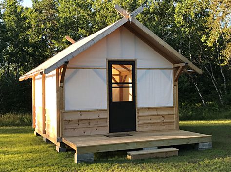 The Canvas Lodge Having a camp-look and unique canopy tarp system, the Canvas Lodge’s 12′ x 14′ design (168 square… Wooden Tent Frame, Canvas Cabin Tent, Diy Canvas Tent, Canvas Tent Diy, Unique Cabins, Small Lodge, Canvas Wall Tent, Tents Camping Glamping, Backyard Cabin