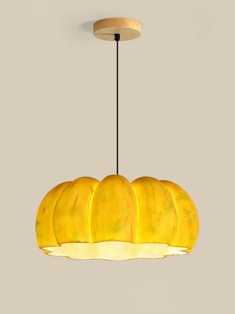 Elegantly brighten any space with The Pumpkin Pendant Light, indoors or outdoors. Crafted from eco-friendly resin, this stylish fixture complements various decors. Experience energy-efficient lighting that captivates with its unique and eye-catching design. Yellow Pumpkin, Energy Efficient Lighting, Small Furniture, Light Yellow, Large Furniture, Pendant Lamp, Pendant Light, Exterior, Led