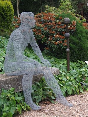 How to Recycle: Chicken Wire Sculptures Waiting by Derek Kinzett Wire Ghosts, Sculptures Sur Fil, Chicken Wire Sculpture, Chicken Wire Art, Chicken Wire Crafts, Wire Sculptures, نباتات منزلية, Wire Art Sculpture, Garden Art Sculptures Diy