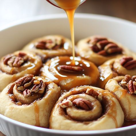 Indulge in our gooey Caramel Pecan Cinnamon Rolls! They’re a delightful treat for your sweet cravings! 🍩🥜 #CinnamonRollLove Caramel Pecan Cinnamon Rolls Ingredients: All-purpose flour (4 cups) Sugar (¼ cup) Instant yeast (2 ¼ tsp) Milk (1 cup, warmed) Butter (½ cup, melted) Eggs (2) Cinnamon (2 tbsp) Brown sugar (½ cup) Pecans (1 cup, chopped) Caramel sauce (1 cup) Instructions: In a bowl, combine warm milk, melted butter, sugar, and yeast. Let it sit for 5 minutes. Add eggs and flour, mi... Sauce For Cinnamon Rolls, Caramel Sauce For Cinnamon Rolls, Caramel Pecan Cinnamon Rolls, Butter Caramel Sauce, Pecan Cinnamon, Pecan Cinnamon Rolls, Butter Caramel, Gooey Caramel, Instagram Recipes