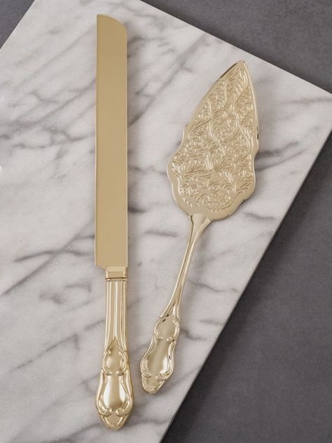 Elegance is best served with a sophisticated design. This shiny gold electroplated zinc and iron alloy cake knife and server set is timeless with classic handles and an ornate embossed server blade. It fits in with vintage, contemporary and eclectic décor making it perfect for weddings, parties and special occasions. Engraved in your choice of lettering style. Details: Size: The wedding cake knife measures 12 inches, and the cake server measures 9 inches long. Engraving Options: The Vintage Serv Rhinestone Wedding Cake, Wedding Cutlery, Wedding Knife Set, Wedding Cake Knife Set, Wedding Cake Server Set, Cake Knife Set, Wedding Cake Prices, Wedding Cake Servings, Wedding Cake Knife