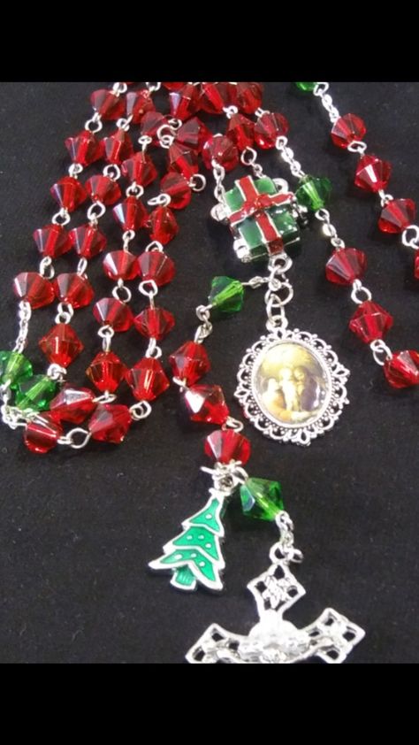 Christmas Rosary with an added extra medal of the Holy Family from TheCandleCardCo on Etsy Christmas tree Charm from PamelaRyanCharms on Etsy. Christmas Rosary, Christmas Tree Charm, The Holy Family, Catholic Rosary, Etsy Christmas, Rosary Catholic, Holy Family, Rosary, Crochet Earrings