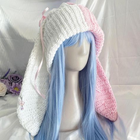 The cutest soft bunny beanie crochet piece with sequins for your winter fashion! ૮ ˶ᵔ ᵕ ᵔ˶ ა‧₊ Carefully handcrafted with love by yours truly.ა❤︎໒꒱  Please allow 2-3 weeks production time as item is made to order.  Free shipping USPS first class within US.  Made with: - 75% Premium Acrylic - Polyamide  - 5% Polystest - Stainless steel hardware and acrylic crystal star + glass teardrop bead for the charm. - Satin pink ribbon for the bows.  Care Instructions:  Regular Cleaning: Dust it off with a Bunny Bonnet Crochet, Crochet Rabbit Beanie, Crochet Hat With Bunny Ears, Crochet Hat Summer, Bunny Custome, Cute Crochet Clothing, Winter Crochet Clothes, Bunny Beanie Crochet, Crochet Bunny Beanie