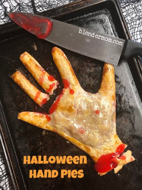 Creepy Halloween Pies, Hand Pie Halloween, Scary Halloween Pies, Hand Pies Halloween, Halloween Handpies, Halloween Hand Food, Halloween Hand Pies, Halloween Party Foods For Adults, Halloween Appetizers For Party Adults