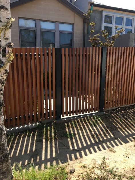 Enhance your home's exterior with these front fence design concepts, combining privacy, security, and style in perfect harmony. #FrontFenceDesign #WoodenFences #FrontYardInspiration #PhilippineFenceStyles #CurbAppealIdeas #ModernFencing #FrontYardDesigns #CreativeBoundaries #HomeExteriorInspo #FenceInspiration Pagar Modern, Fence Design Wood, Fence Design Ideas, Wood Fence Design, Fence Gate Design, House Fence Design, Modern Fence Design, Brick Fence, Privacy Fence Designs