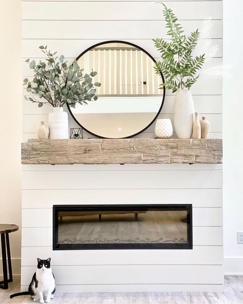 A House We Built on Instagram: “On our fireplace mantel, I mixed white and wood vases with faux greenery for summer. My favorite round black mirror has been the one…” Round Mirror Over Mantle, Mantle Decorating Ideas With Mirror, Fire Mantle, A House We Built, Mirror Over Fireplace, Farmhouse Fireplace Mantels, Mantle Decorations, Mantle Ideas, Fireplace Mantle Decor