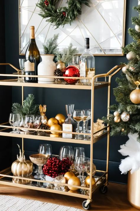 Style your bar cart for festive entertaining with a touch of sophistication. Discover tips for arranging drinks, glassware, and decorations for a chic holiday beverage station. Bar Cabinet Christmas Decor, Bar Cart Christmas Styling, Christmas Beverage Station, Christmas Party Bar Setup, Bar Cart Christmas Decor, Holiday Bar Cart Christmas, Christmas Bar Cart Styling, Bar Cart Christmas, Home Bar Cart