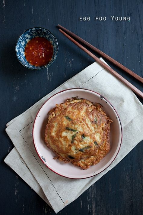 Delicious Chinese omelet, egg foo young, with pork and vegetable filling. Popular egg dish that is placed on a plate with hot sauce on the side. Egg Foo Young Recipe, American Chinese Food, Rasa Malaysia, Easy Chinese Recipes, Easy Eggs, Asian Flavors, Chinese Dishes, Chinese Cooking, Easy Delicious Recipes