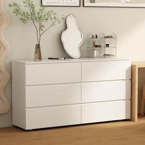 PRICES MAY VARY. Minimalist & Contemporary - This white dresser no handles shows minimalism and modernization for your bedroom. Combing with simple appearance and compact construction, this dresser would perfeclty suit most your home themes. Ample Storage - There are 6 spacious drawers designed with no handles, each of which as a depth of 11.8 inches, providing enough storage space for your clothing, baby changing, decorations, and so on. The 59 inch tabletop gives you option to display your pho Clothing Dresser Ideas, White Long Dresser, Cute White Dresser, Dresser Inspo Bedroom, Nyc Room Decor, White Dresser Aesthetic, Cute Dressers For Bedroom, Dresser Room Ideas, Drawers In Bedroom