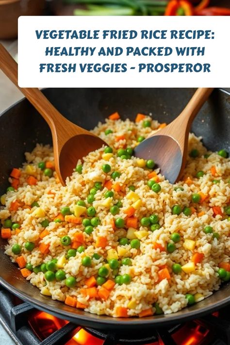 Vegetable fried rice in a wok with peas, corn, and carrots, accompanied by wooden spoons. Vegetable Rice Instant Pot, Rice And Vegetable Recipes, Stir Fry Rice Recipe, Stir Fried Rice Recipe, Healthy Fried Rice, Vegetable Fried Rice Recipe, Stir Fry Rice, Vegetable Fried Rice, Vegetable Rice