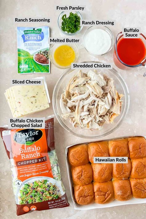 These mouthwatering Buffalo Chicken Sliders feature tender shredded chicken tossed in spicy buffalo sauce, nestled between soft slider buns and topped with crisp lettuce and creamy buffalo ranch dressing. The perfect combination of heat and coolness in every bite makes these sliders an irresistible crowd-pleaser for any gathering or game day event. Buffalo Chicken Sliders With Coleslaw, Healthy Chicken Sliders, Shredded Buffalo Chicken Sliders, Buffalo Ranch Dressing, Spicy Buffalo Sauce, Food Core, Shredded Buffalo Chicken, Buffalo Chicken Sliders, Buffalo Chicken Pizza