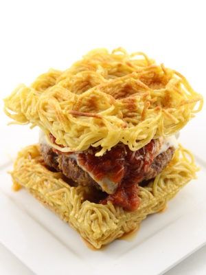 The Waffled Spaghetti Bun Burger | DudeFoods.com Waffle Spaghetti, Waffle Board, Carrot Cake Waffles, Zucchini Waffles, Grilled Cheese Waffles, Waffle Pizza, Best Waffle Recipe, Dude Food, Cinnamon Roll Waffles