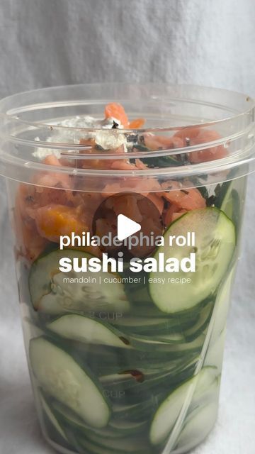 Erin Silberman on Instagram: "Philadelphia Roll Sushi Salad   •Follow @seriousfoodfetish for more recipes, restaurant recs & food trends•  There’s a creator named @logansfewd who has been making this thinly sliced cucumber salad almost every day in a container & changes out the flavors. I couldn’t get it out of my head, so I had to make my own & it’s so incredibly easy since you use a mandolin. Will be making this again tomorrow!   Ingredients  •1 cucumber •smoked salmon, chopped •2-3 T cream cheese  •1 T light soy sauce  •1 T ginger salad dressing  •furikake seasoning   Recipe 1. Use a mandolin to slice a whole cucumber into a container.  2. Add salmon, soy sauce, dressing, cream cheese, & furikake. Shake until well combined.  3. Serve in a bowl with more furikake on top. Enjoy!" Smoked Salmon Cucumber Salad, Cucumber Sushi Salad, Sushi Cucumber Salad, California Roll Cucumber Salad, Furikake Seasoning Recipe, Philadelphia Roll Sushi, Philadelphia Roll, Ginger Salad Dressing, Soy Sauce Dressing