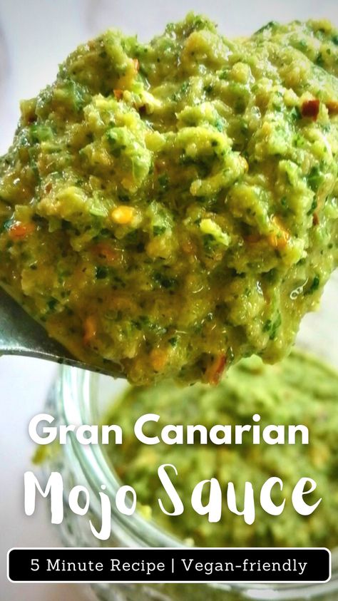 A spoonful of green mojo sauce is lifted out of a jar. Mojo Verde Sauce, Spanish Bbq Ideas, Canarian Potatoes, Moroccan Sauce, Spanish Sauce Recipe, Mojo Sauce Recipe, Mojo Marinade, Mojo Verde, Mojo Sauce