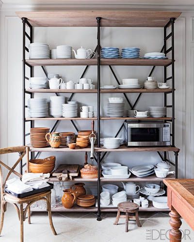 An étagère by Coudanne & Cie in the kitchen displays the couple’s collection of 19th-century china, hotel tableware, and Provençal pottery. Shelving For Pantry, Pantry Shelves Diy, Free Standing Pantry, Standing Pantry, Kitchen Standing Cabinet, Diy Pantry Shelves, Free Standing Kitchen Cabinets, Pantry Shelves, Pantry Shelving