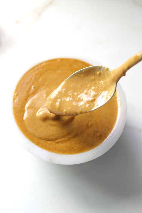 The perfect dip or dressing for salads, spring rolls or rice paper rolls - this Spicy Peanut Sauce is a delicious blend of flavors that is finger licking good | ThisSavoryVegan.com #vegan #peanutsauce #dressing Vegan Rice Paper Rolls, Easy Peanut Sauce, Peanut Dipping Sauce, Peanut Sauce Recipe, Thai Peanut Sauce, Peanut Dipping Sauces, Spicy Peanut Sauce, Rice Paper Rolls, Cilantro Sauce