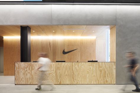 Gallery of Nike New York Headquarters / WSDIA | WeShouldDoItAll + STUDIOS Architecture - 7 Nike Office, Reception Office, Fitness Space, Cycling Studio, Office Mural, Reception Desk Design, Office Lobby, Studios Architecture, Office Entrance