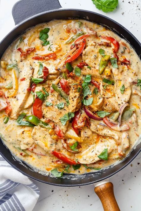 Creamy Garlic Pesto Chicken Recipe - #eatwell101 #recipe This #stir-fry #chicken with #pesto, #sun-dried #tomatoes and bell #peppers in a #creamy #garlic sauce is simply amazing.  - #recipe by #eatwell101® Garlic Pesto Chicken, Chicken With Pesto, Pesto Chicken Recipe, Garlic Pesto, Chicken Pesto Recipes, Fry Chicken, Creamy Garlic Sauce, Sun Dried Tomatoes, Chicken Stir Fry