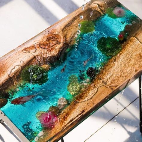 Let's Resin on Instagram: "Hello, sweeties. 🥰We know that many artists combine wood with resin to create indoor furniture. Today, we also want to have a try. We use wood, epoxy resin, and our newly released resin table mold to create an epoxy resin river table with koi fish. If you are interested in that, check out today's video. Use code: "hdpemold" to get 30% off." River Resin Art, Koi Fish Resin Table, Resin River Table, River Tables Epoxy, Epoxy River Table, River Table, Arrow Stencil, Diy Resin Table, Resin Crafts Tutorial