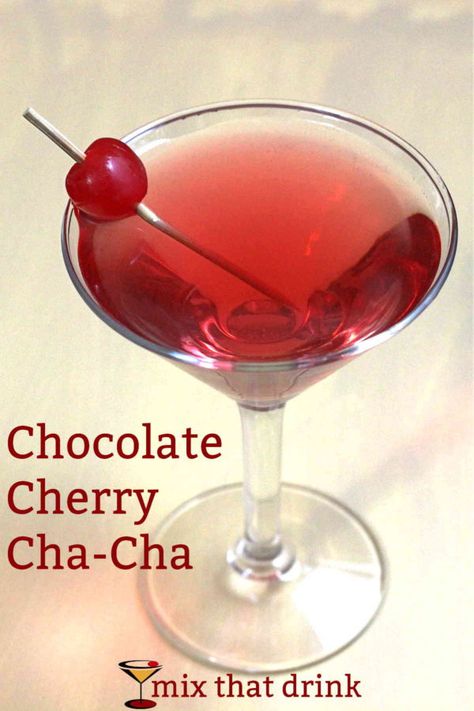 The Chocolate Cherry Cha-Cha drink recipe was the result of an hours' long recipe experimenting session with a friend. When we put coconut rum with chocolate and cherry flavors, we never expected it to taste uncannily like a chocolate covered cherry, but that's what happened. Cherry Cheesecake Martini, Drinks With Chocolate Vodka, Chocolate Rum Drinks, Chocolate Vodka Drinks, Chocolate Vodka Recipes, Cherry Liqueur Cocktails, Cherry Vodka Drinks, Chocolate Vodka, Malibu Drinks