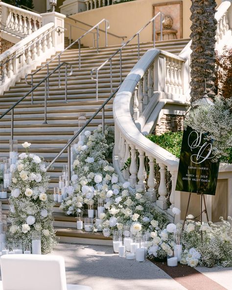 We’re not over this gorgeous wedding with @sarahfbabeee & @daddyth3father at Green Valley Ranch & Spa Venue: @gvrevents Planner: @Brookebriannevents Photography: @Kristenjoyphoto @kyleejoyphoto Videography: @Andonigarciafilms Candles: @LuminaryVegas Calligraphy: @tallymarkcalligraphy Rentals & custom printing: @blueprintstudiosevents Tabletop: @hensleyeventresources Linen: @bbjlatavola Gown: @Perlabridal Tux: @friartux Floral: @ofthedesertflor Hair & makeup: @makeupint... Candle Isle, Wedding Aisle Candles, Wedding Staircase, Aisle Candles, Opulent Wedding, White Flower Arrangements, Unique Wedding Ideas, Enchanted Wedding, Wedding Money