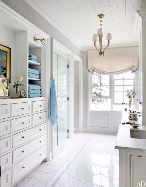 At a Maine compound by designer Suzanne Kasler and architect Les Cole, the master bath boasts custom-made mosaic tile by Waterworks and light fixtures from Circa Lighting | archdigest.com Deco Baroque, Suzanne Kasler, Large Bathroom, Home Luxury, Room Interior Design, Bath Remodel, Cheap Decor, Beautiful Bathrooms, White Cabinets