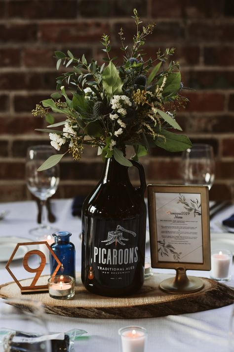 Brewery Centerpieces, Whiskey Bottle Centerpiece, Growler Centerpiece Wedding, Bottle Centrepiece, Growler Centerpiece, Masculine Party, Bourbon Wedding, Jamaican Party, Beer Party Theme