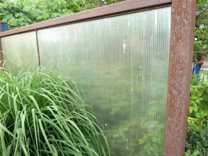 repurposed shower door Repurposed Shower Doors, Repurpose Shower Doors, Gray Images, Old Wooden Shutters, Outdoor Privacy Screens, Recycled Door, Tile Cleaner, Gardening Journal, Upcycled Garden