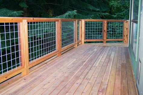 Cedar deck and hogwire rail Reling Design, Deck Railing Diy, Wire Deck Railing, Hog Wire Fence, Deck Railing Ideas, Patio Railing, Deck Railing Design, Cattle Panels, Cedar Deck