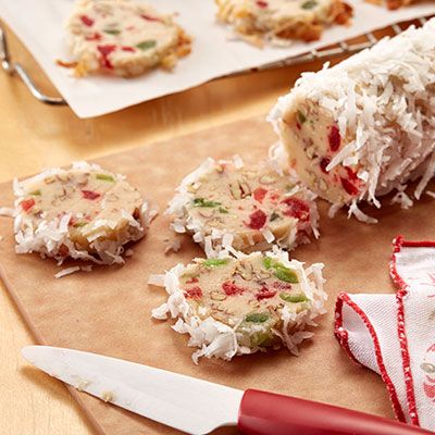 A retro cookie sometimes known as Santa's Whiskers. These slice and bake cookies are filled with cherries and pecans and then rolled in coconut. No Bake Fruit Cake, Fruit Cake Cookies Recipe, Cake Cookies Recipe, Fruitcake Cookies, Slice And Bake Cookies, Christmas Cookie Exchange Recipes, Xmas Recipes, Fruit Cake Cookies, Cookie Exchange Recipes