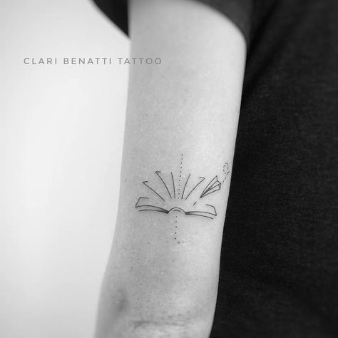 Abstract Book and Paper Plane Tattoo by Clari Benatti Small Book Tattoo, Bookworm Tattoo, Writer Tattoo, Paper Airplane Tattoos, Paper Plane Tattoo, Tiny Bird Tattoos, Plane Tattoo, Bookish Tattoos, Airplane Tattoos