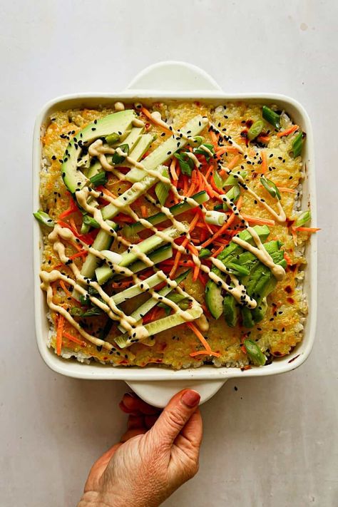 Vegan Sushi Bake combines the familiar flavors of sushi in a deconstructed, oven-baked format that's both easy to make and incredibly satisfying. If you like sushi, this vegan sushi bake is perfect for gatherings, potlucks, or just a cozy night in. Tofu Sushi Bake, Vegan Sushi Bake, Sushi Bake With Cauliflower Rice, Cauliflower Rice Sushi Bake, Vegan Sushi Burrito, Sushi Bake, Vegan Mayo, Vegan Sushi, Meat Free Recipes