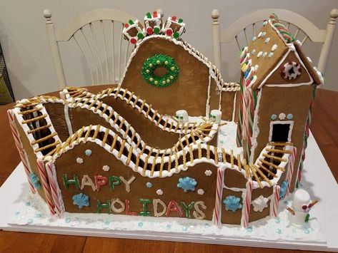 Gingerbread Roller Coaster, Gingerbread House Ideas Unique, Unique Ginger Bread House Ideas, Gingerbread Structure Ideas, Marvel Gingerbread House, Unique Gingerbread Creations, Santas Workshop Gingerbread House Ideas, Insane Gingerbread Houses, Crazy Gingerbread Houses