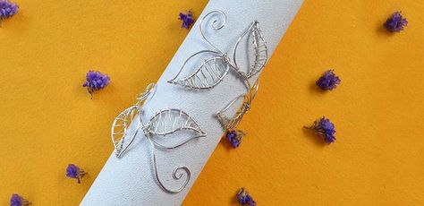 Wire Jewelry Tutorial On Making a Silver Wire Wrapped Flower Arm Cuff Bracelet Flower Arm Cuff, Wire Wrapped Flower, Silver Arm Cuff, Handmade Bracelets Tutorial, Cuffs Diy, Prom Corsages, Wrap Bracelet Tutorial, Wired Jewelry, Arm Cuff Bracelet