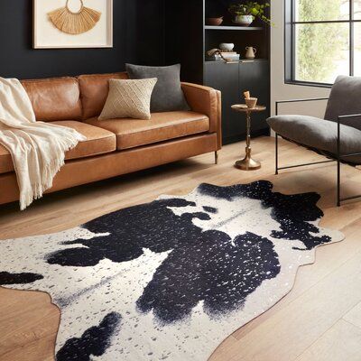 A compelling variant of the timeless cowhide Duran Black/Silver Area Rug, the Duran collection touts rich metallic accents set against versatile neutral tones. Duran offers long-wearing durability for your busiest living room, dining area and entry way. Rug Size: Rectangle 3'10" X 5' Faux Hide Rug, Faux Cowhide Rug, White Living Room Decor, Alexander Home, Faux Cowhide, Hide Rug, Artisan Rugs, Loloi Rugs, Silver Rug